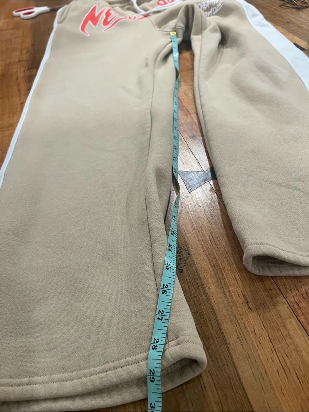 Fashion Nova Beige Joggers with Red 'New York' Graphic and White Side Stripe